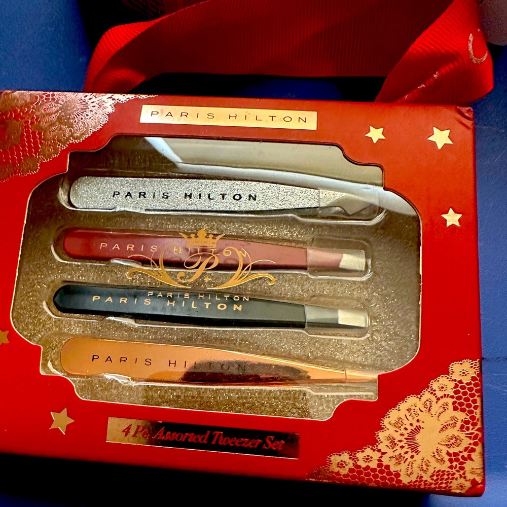 New never opened Paris Hilton Tweezers